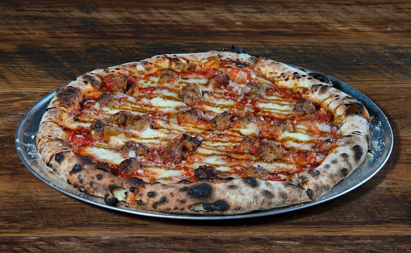 meat lovers pizza overloaded with toppings